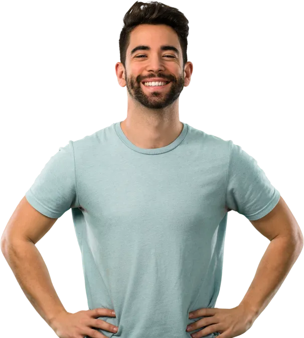 Smiling man with his arms around his waist.